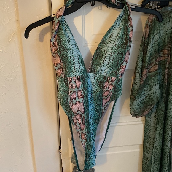 Two-piece, bathing suit with the one piece and then the cover-up - Picture 2 of 4